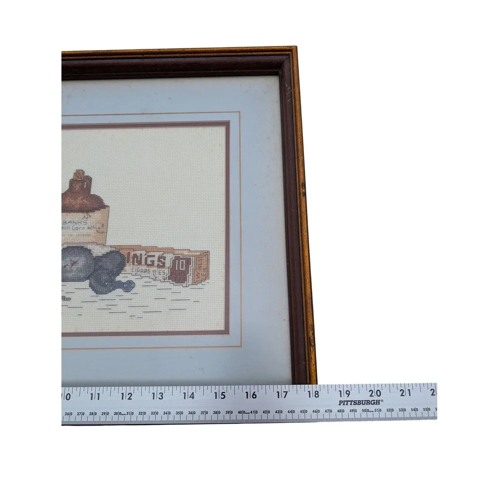 Vintage Framed Cross Stitch Duck Decoy Whiskey Jug Oil Lamp Needlepoint Art